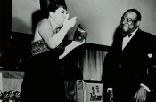 Katyna Ranieri receives the Golden Grammy Award from Count Basie for  Riz Ortolani for “Best Instrumental Theme: MORE”
