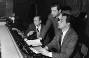 Franco Prosperi, Gualtiero Jacopetti and Riz Ortolani at the console during the recording of the music for the movie “Mondo Cane” in Rome